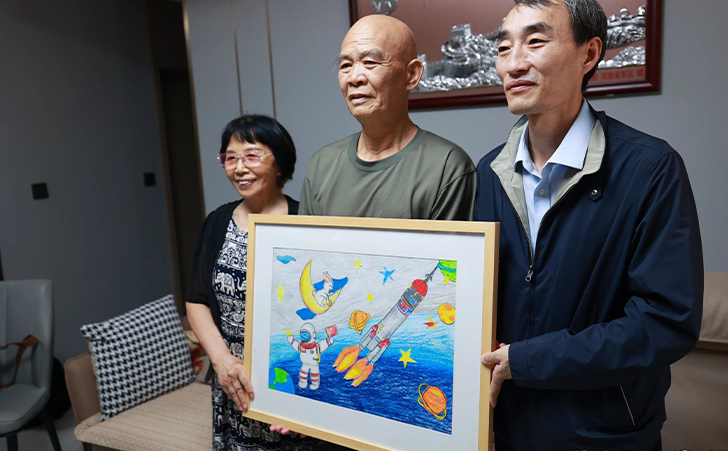 吴拥军和陈冬父母合影