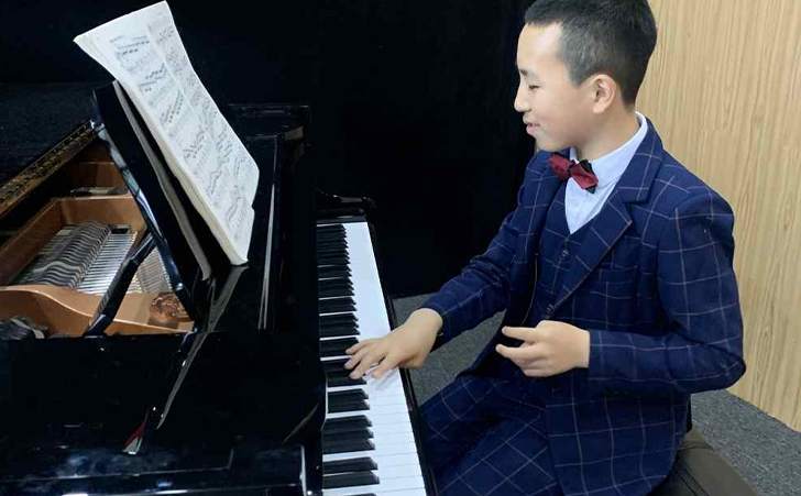 少年从双手无抓握能力到获得钢琴(社会艺术水平音乐考级钢琴专业 少年从双手无抓握能力到获得钢琴(社会艺术水平音乐考级钢琴专业